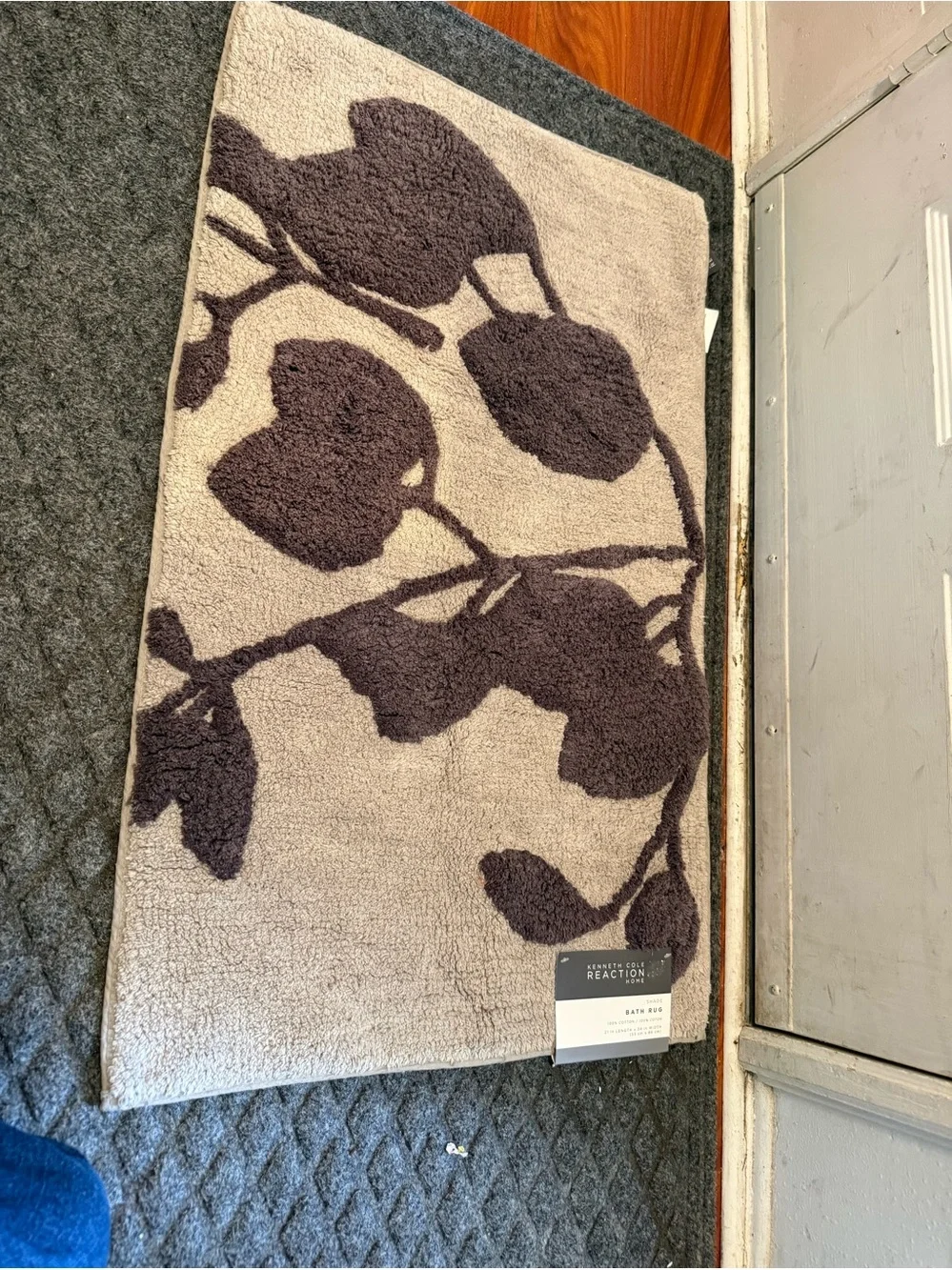 Kenneth Cole Beige Bath Mat with Dark Brown Floral Silhouette